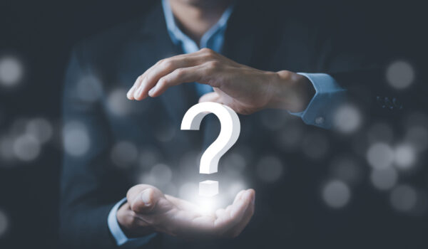 ask-question-online-concept-businessman-hand-hold-interface-question-marks-sign-web-question-marks-drawn-black-background-concept-searching-answer-uncertainty-problem-solving Ask question online concept, Businessman hand hold interface question marks sign web, Question marks drawn on black background. Concept of searching for an answer, Uncertainty and problem solving.